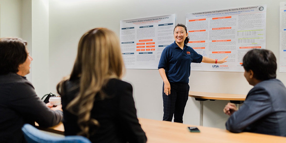 Students presenting research poster