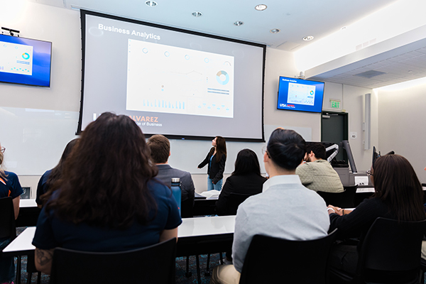 Student presenting business analytics presentation
