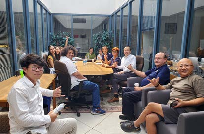 Group of Ph.D. students in meeting room