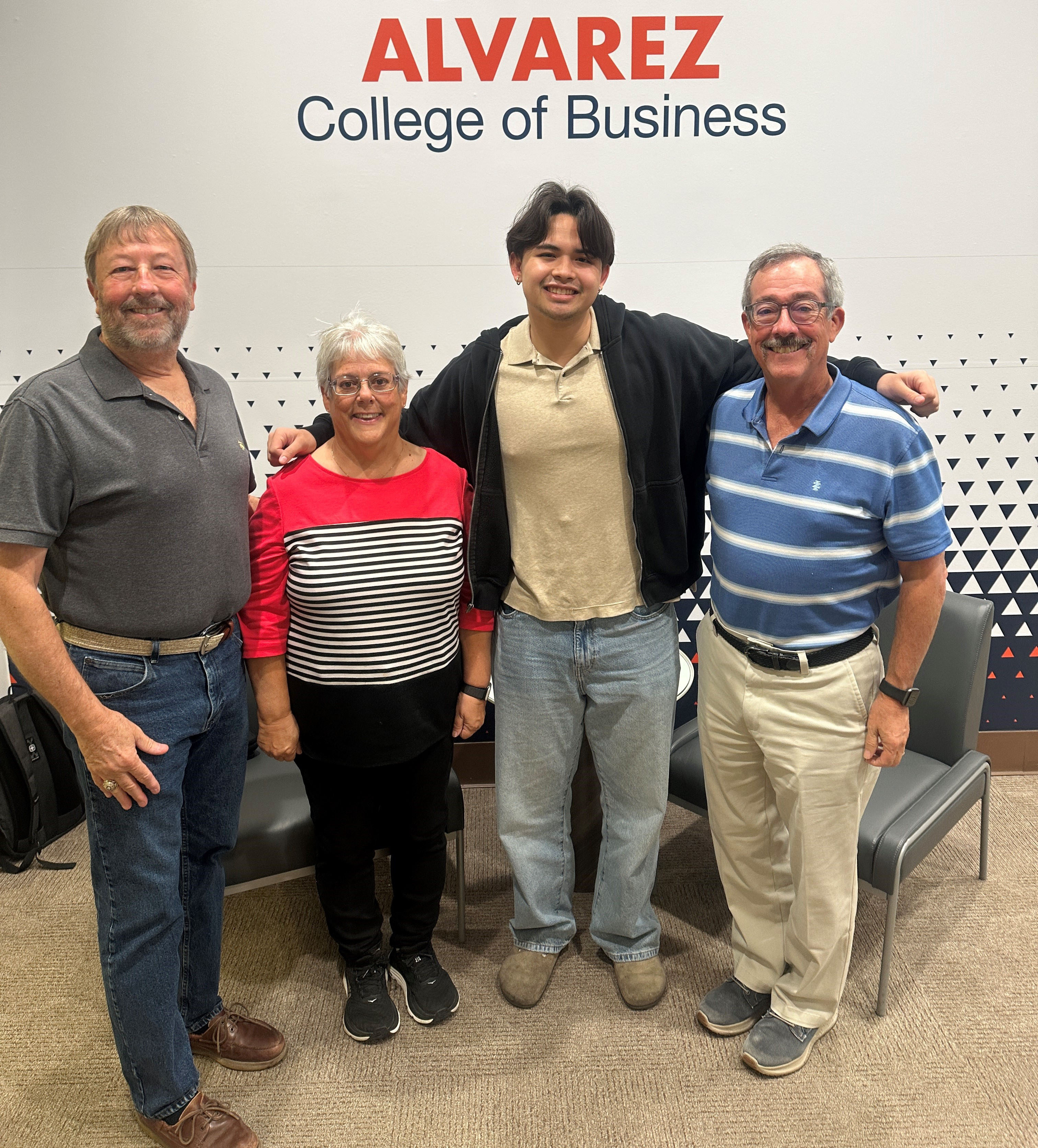 Grant family members with their scholarship recipient