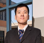 David Han in front of Business Building