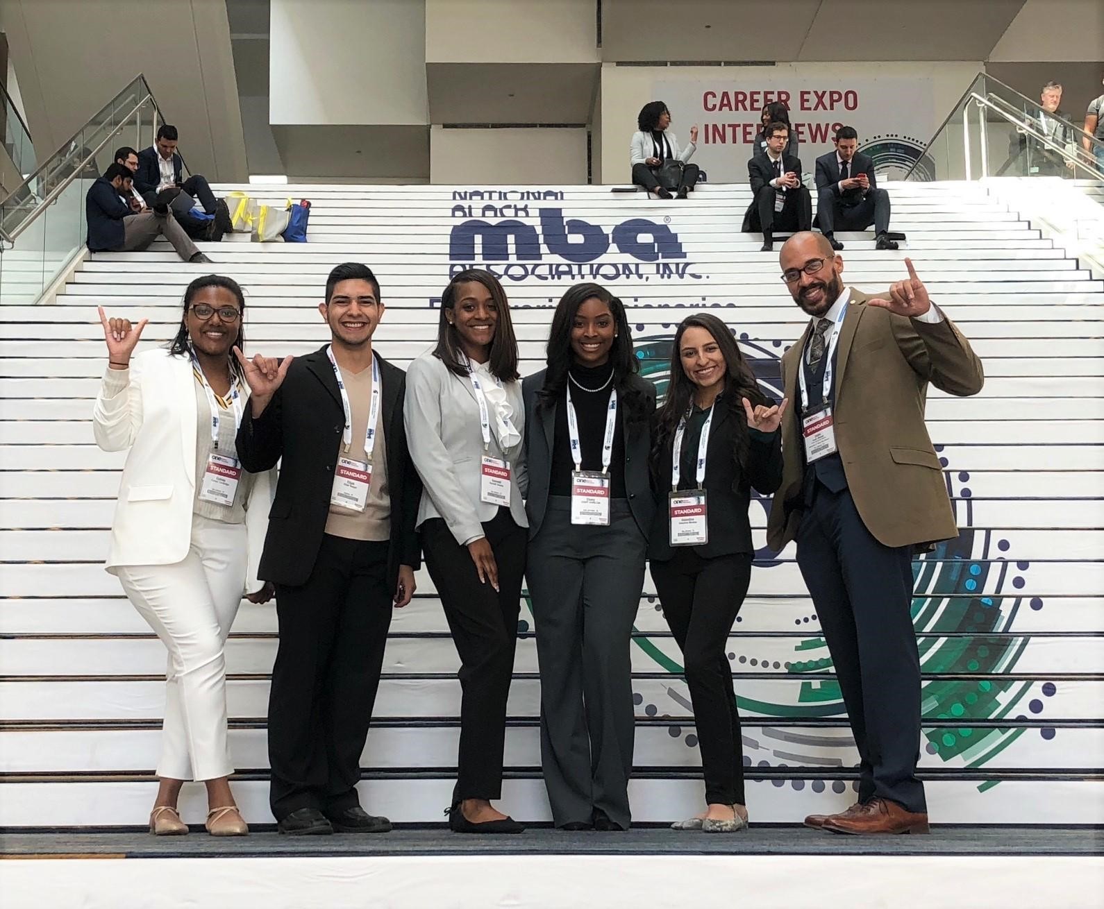 Graduate students at NBMBA conference