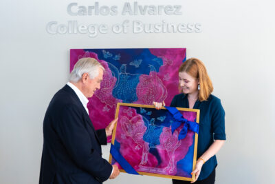 Carlos Alvarez gift presentation by SGA President