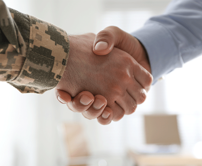 Veteran and Civilian shaking hands