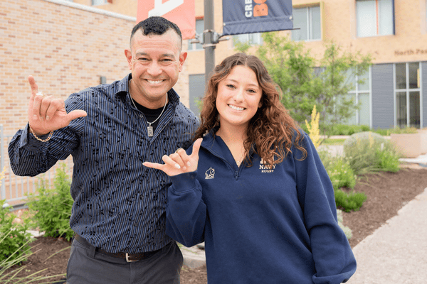 Graduate Rene Anderson pictured with his daughter