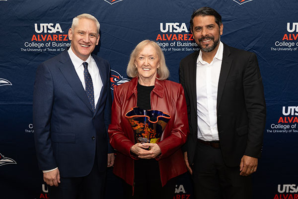 Retiree Elaine Sanders is pictured with Dean Halbesleben and Senior Associate Dean Juan Manuel Sanchez