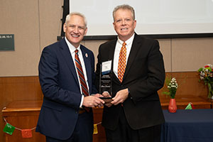 Glenn Errhalt receives his award from Dean.